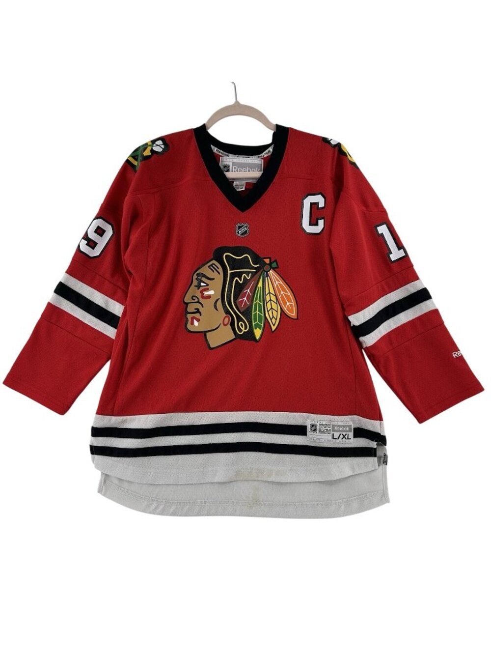 Reebok Chicago Blackhawks Jonathan Toews #19 NHL Youth L/XL Jersey Red